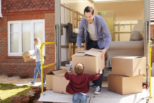 Packed boxes and moving crew prepared for a Kingston relocation