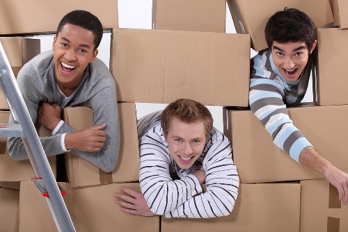 Loading furniture into a removals van in Kingston