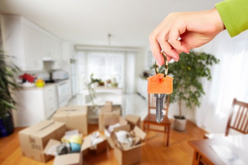 Professional moving crew unloading at a Kingston property