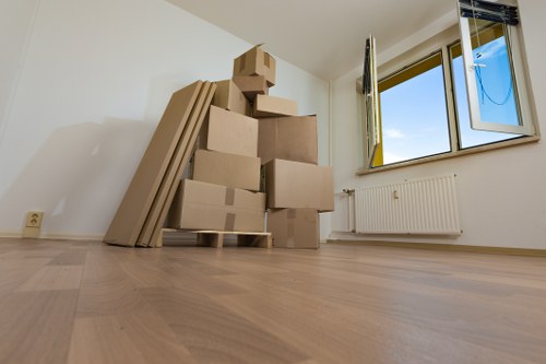 Office relocation planning and moving boxes in Kingston