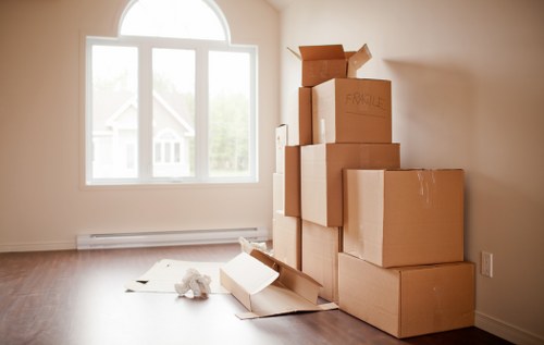 Moving team handling household items for a Kingston house removal