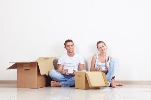 Moving boxes and household items ready for transport in Kingston