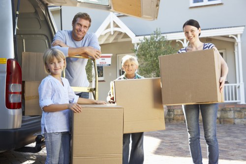 Kingston moving service loading items into a van