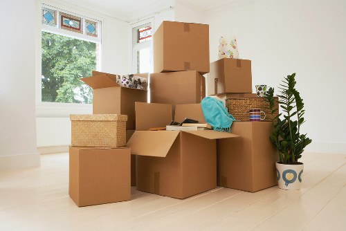 Van loading boxes and household items for a Kingston move