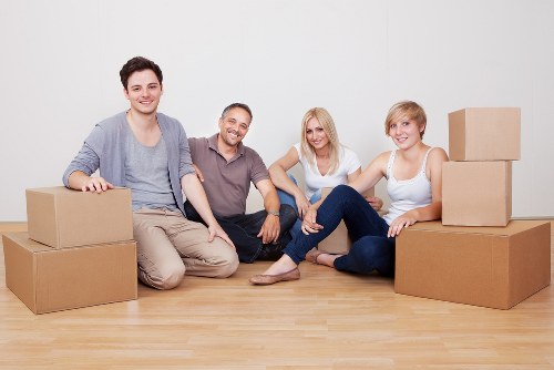 Furniture being carried from a Kingston property during a house move